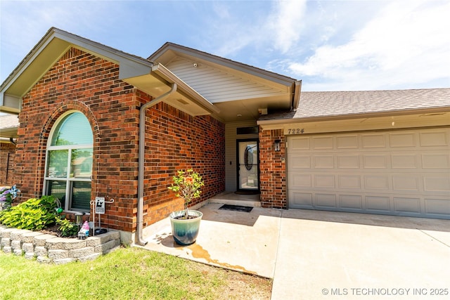7224 NW 102nd, Oklahoma City, OK 73162 - ranch-style house with brick siding, an attached garage, and concrete driveway