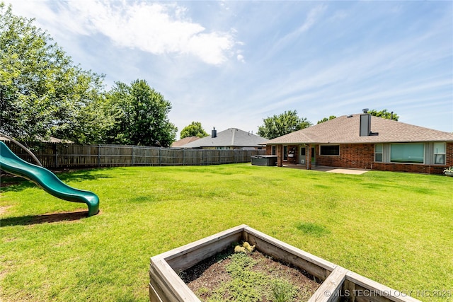 7224 NW 102nd, Oklahoma City, OK 73162 - fenced backyard with a playground and a patio area