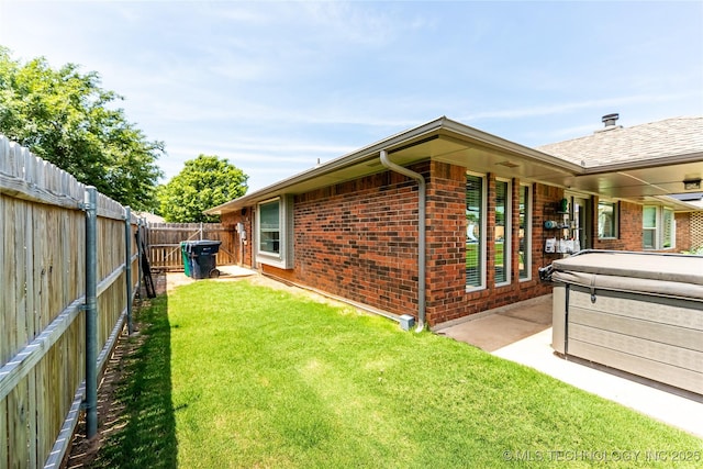 7224 NW 102nd, Oklahoma City, OK 73162 - fenced backyard with a hot tub and a patio