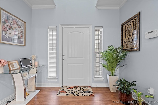 303 Hidden Path, Ardmore, OK 73401 - foyer entrance featuring ornamental molding and wood finished floors
