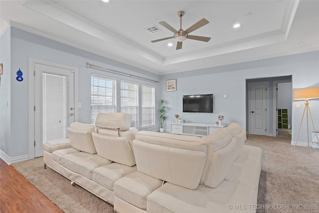 303 Hidden Path, Ardmore, OK 73401 - living area featuring a tray ceiling, ceiling fan, recessed lighting, and ornamental molding