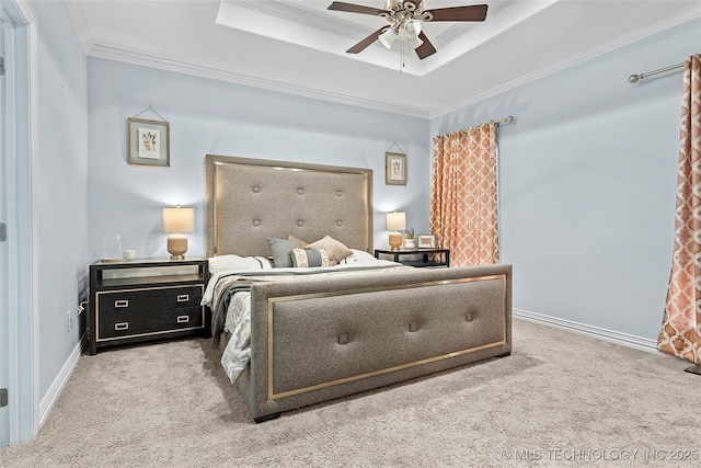 303 Hidden Path, Ardmore, OK 73401 - carpeted bedroom featuring a raised ceiling, ornamental molding, and a ceiling fan
