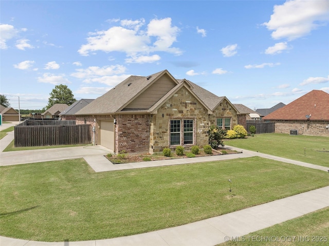 303 Hidden Path, Ardmore, OK 73401 - view of front facade featuring concrete driveway, an attached garage, brick siding, stone siding, and roof with shingles