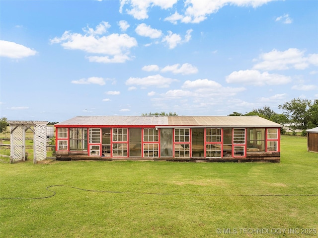 14820 Memorial, Wilson, OK 73463 - back of property with exterior structure, a yard, and an outdoor structure