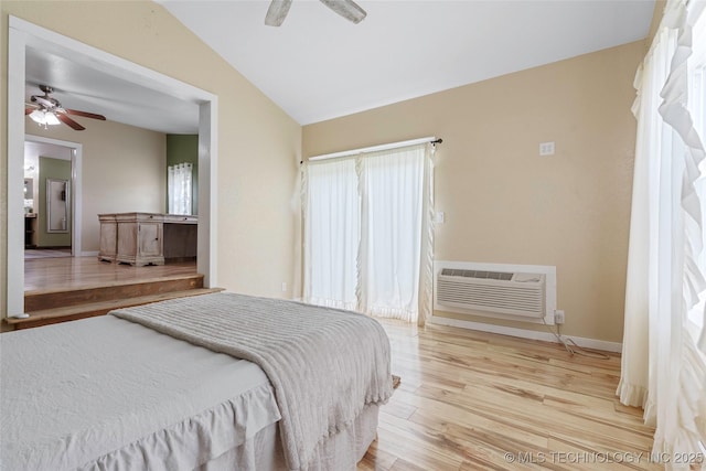 14820 Memorial, Wilson, OK 73463 - bedroom featuring a wall mounted air conditioner, wood finished floors, lofted ceiling, and ceiling fan