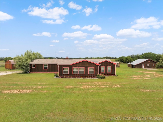 14820 Memorial, Wilson, OK 73463 - view of front of property with a front yard and an outdoor structure