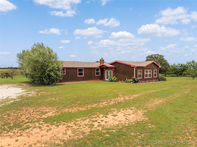 14820 Memorial, Wilson, OK 73463 - view of front of home with a front lawn and a chimney