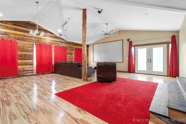 14820 Memorial, Wilson, OK 73463 - living area featuring lofted ceiling, french doors, wood finished floors, ceiling fan, and wood walls