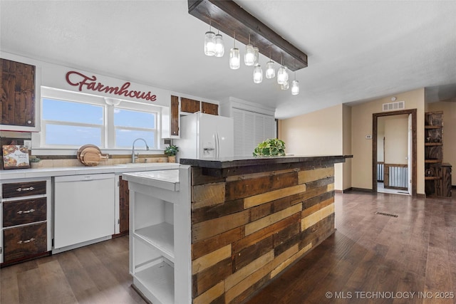 14820 Memorial, Wilson, OK 73463 - kitchen with white appliances, dark wood-style flooring, open shelves, and a kitchen island