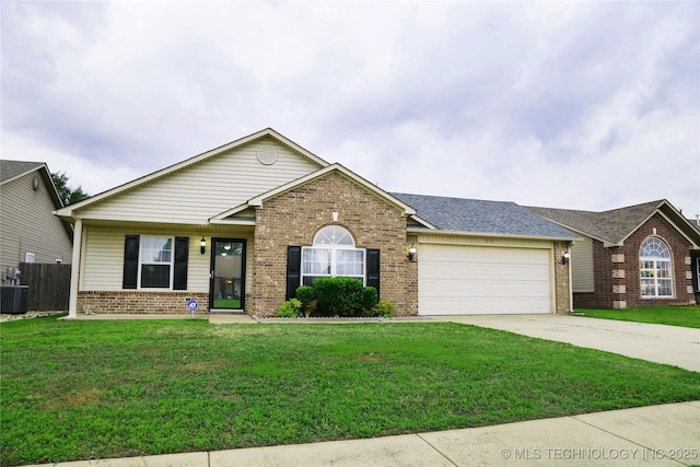 614 S Seminole St, Skiatook, OK 74070 - view of front of house featuring brick siding, an attached garage, driveway, and roof with shingles