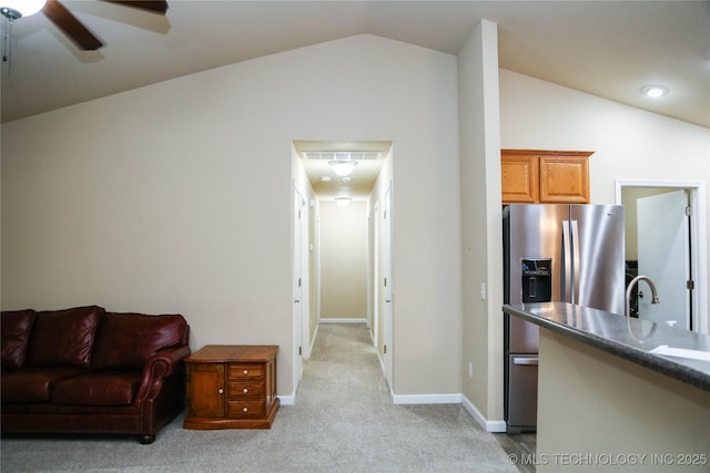 614 S Seminole St, Skiatook, OK 74070 - living area with light carpet, lofted ceiling, a ceiling fan, and recessed lighting