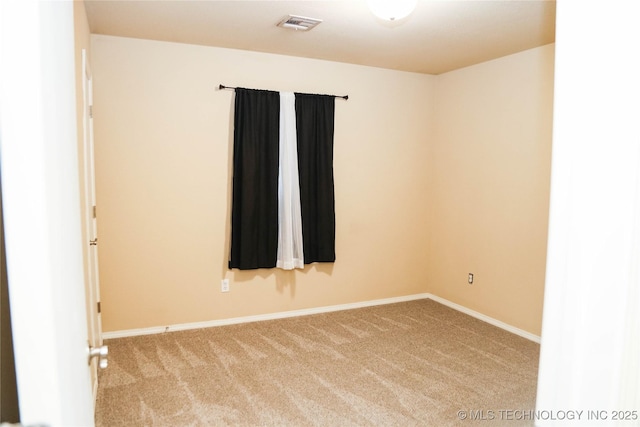 614 S Seminole St, Skiatook, OK 74070 - spare room featuring carpet and baseboards