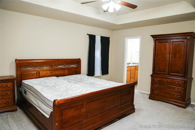 614 S Seminole St, Skiatook, OK 74070 - bedroom featuring light carpet, connected bathroom, and a ceiling fan