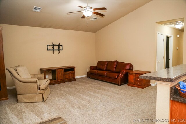 614 S Seminole St, Skiatook, OK 74070 - carpeted living room with lofted ceiling and a ceiling fan