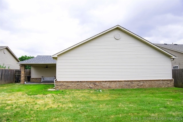 614 S Seminole St, Skiatook, OK 74070 - view of side of home featuring ceiling fan, a shingled roof, and a patio area