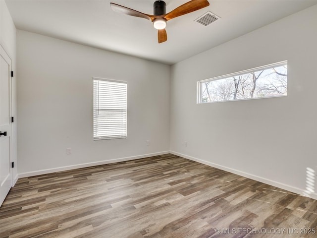 7 Port Duncan Blvd, Afton, OK 74331 - unfurnished room with wood finished floors and ceiling fan