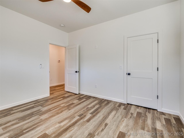 7 Port Duncan Blvd, Afton, OK 74331 - unfurnished bedroom with light wood-style floors and ceiling fan