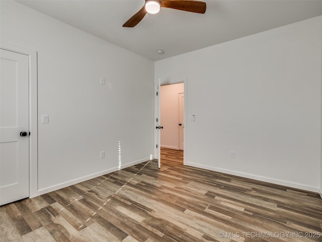 7 Port Duncan Blvd, Afton, OK 74331 - empty room featuring ceiling fan and wood finished floors