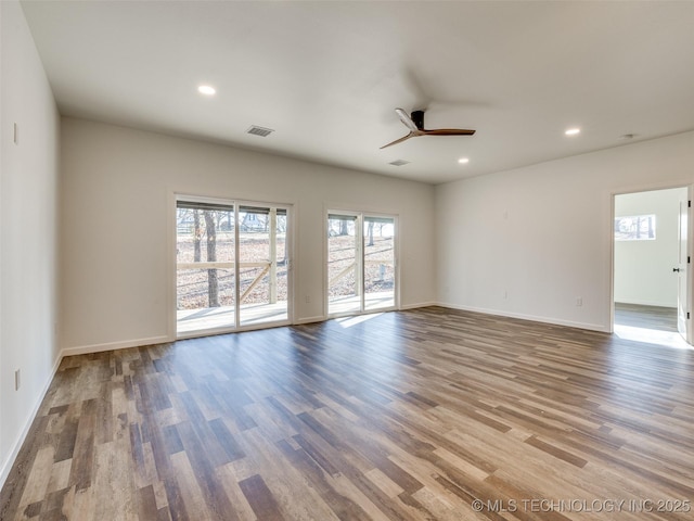 7 Port Duncan Blvd, Afton, OK 74331 - unfurnished room with ceiling fan, wood finished floors, and recessed lighting