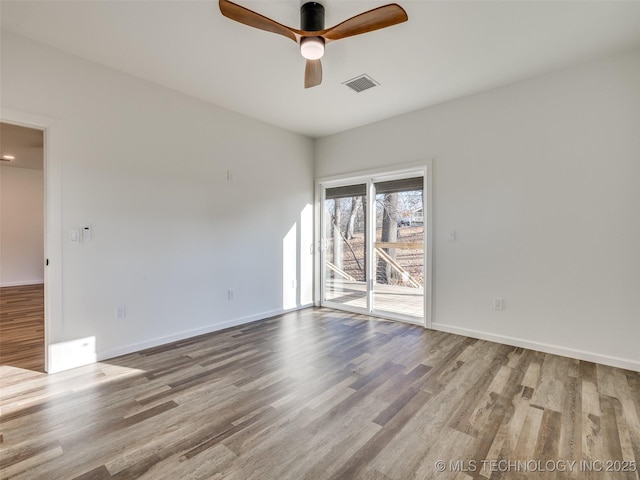 7 Port Duncan Blvd, Afton, OK 74331 - empty room featuring wood finished floors and a ceiling fan