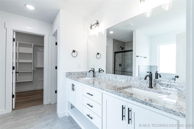 10917 S 271st E Ave, Coweta, OK 74429 - full bath with a shower stall, double vanity, and a walk in closet