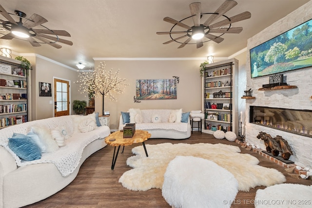 20672 E Kambrie St, Inola, OK 74036 - living area with a ceiling fan, wood finished floors, ornamental molding, and a fireplace