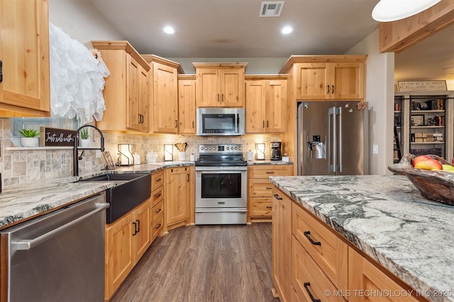 20672 E Kambrie St, Inola, OK 74036 - kitchen with stainless steel appliances, light brown cabinets, dark wood-style flooring, light stone countertops, and recessed lighting
