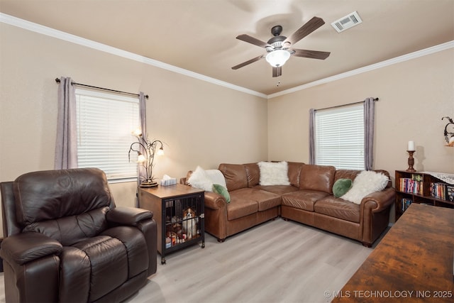 20672 E Kambrie St, Inola, OK 74036 - living area with light wood finished floors, plenty of natural light, a ceiling fan, and ornamental molding