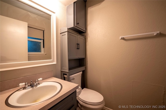 12922 S 123rd E Ave, Broken Arrow, OK 74011 - half bathroom featuring vanity and a textured wall