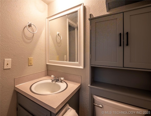 12922 S 123rd E Ave, Broken Arrow, OK 74011 - bathroom with vanity and a textured wall
