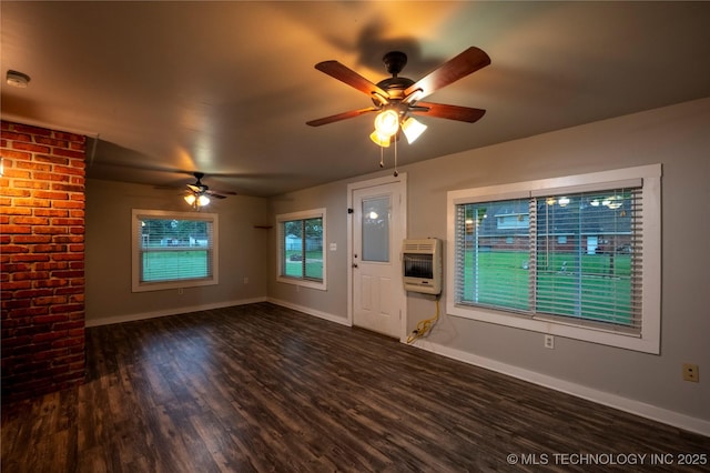 12922 S 123rd E Ave, Broken Arrow, OK 74011 - unfurnished living room featuring heating unit, a ceiling fan, and wood finished floors