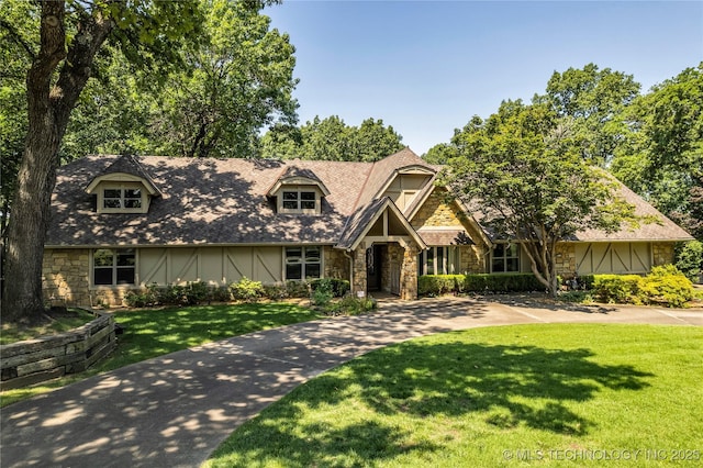 9916 S Quebec Ave, Tulsa, OK 74137 - view of front of house with stone siding and a front lawn