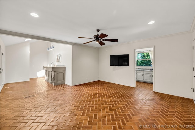 9916 S Quebec Ave, Tulsa, OK 74137 - unfurnished living room with ceiling fan, recessed lighting, and crown molding