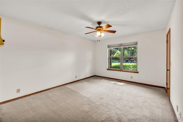 9916 S Quebec Ave, Tulsa, OK 74137 - carpeted spare room featuring a ceiling fan and a textured ceiling