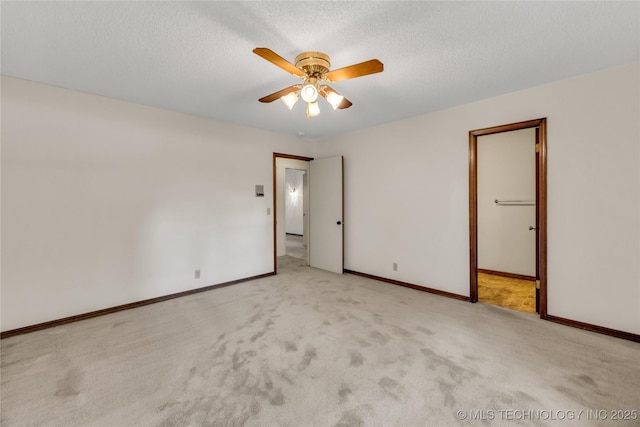 9916 S Quebec Ave, Tulsa, OK 74137 - unfurnished bedroom featuring carpet, a textured ceiling, and a ceiling fan