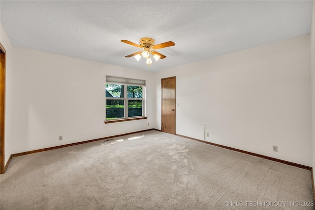 9916 S Quebec Ave, Tulsa, OK 74137 - empty room featuring carpet, ceiling fan, and a textured ceiling