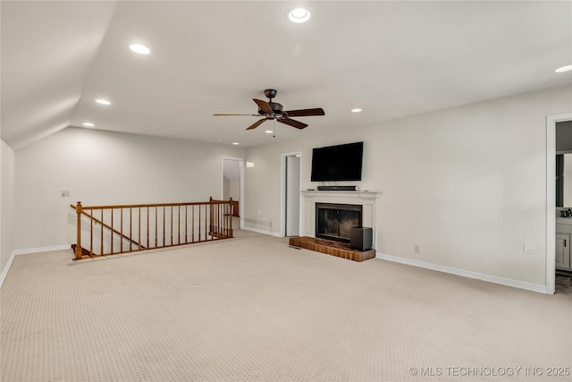 9916 S Quebec Ave, Tulsa, OK 74137 - unfurnished living room with carpet, a ceiling fan, recessed lighting, a fireplace, and lofted ceiling