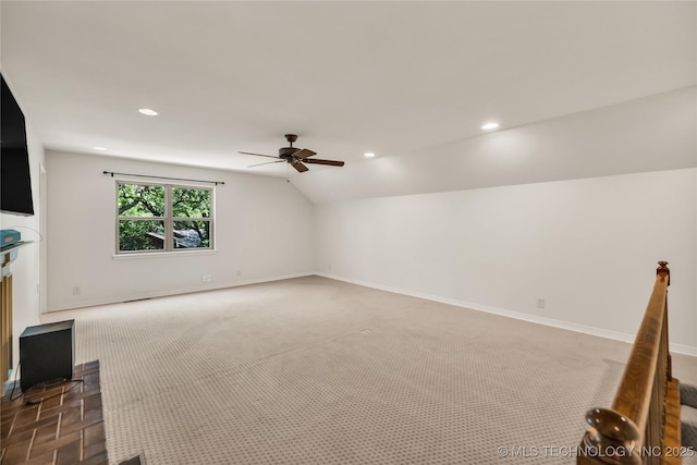 9916 S Quebec Ave, Tulsa, OK 74137 - unfurnished living room featuring ceiling fan, lofted ceiling, recessed lighting, and carpet floors