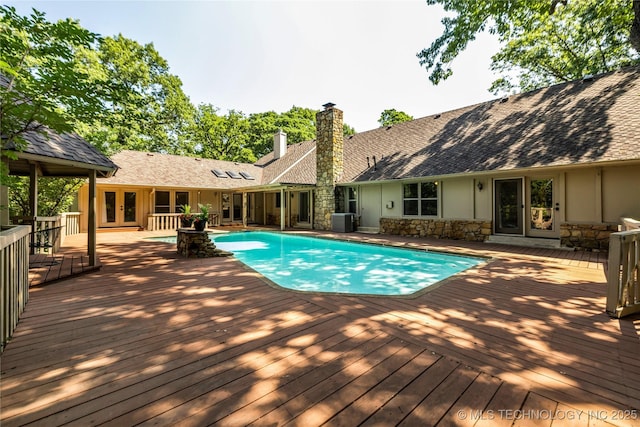 9916 S Quebec Ave, Tulsa, OK 74137 - outdoor pool with french doors and a deck