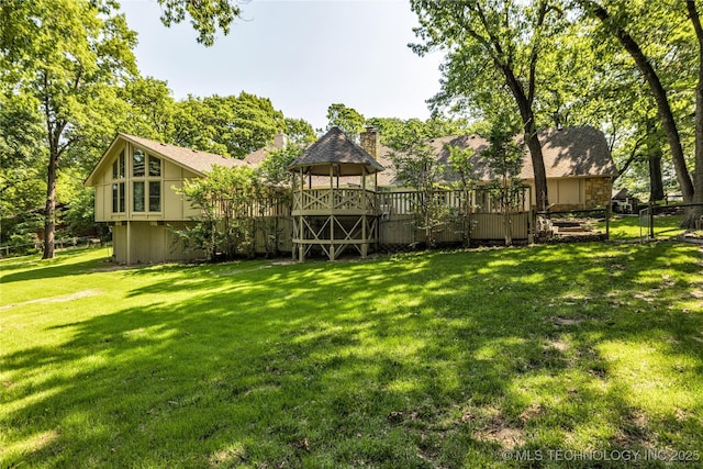 9916 S Quebec Ave, Tulsa, OK 74137 - view of yard featuring a deck and a gate