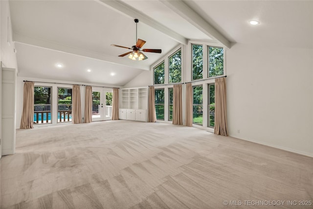 9916 S Quebec Ave, Tulsa, OK 74137 - unfurnished living room featuring carpet floors, ceiling fan, beam ceiling, high vaulted ceiling, and french doors