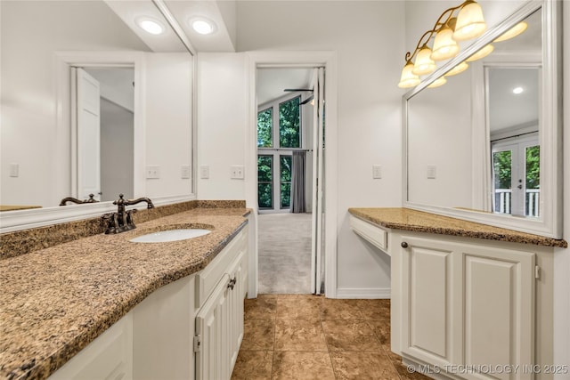 9916 S Quebec Ave, Tulsa, OK 74137 - bathroom featuring vanity, plenty of natural light, tile patterned flooring, and recessed lighting