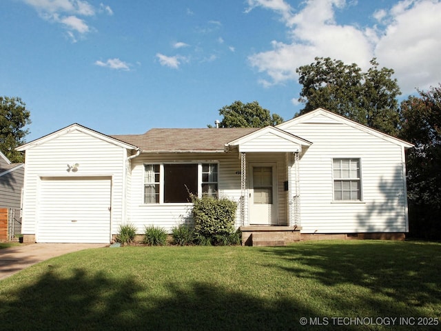 4957 S Cincinnati Ave, Tulsa, OK 74105 - ranch-style home featuring concrete driveway, a garage, a front yard, and roof with shingles