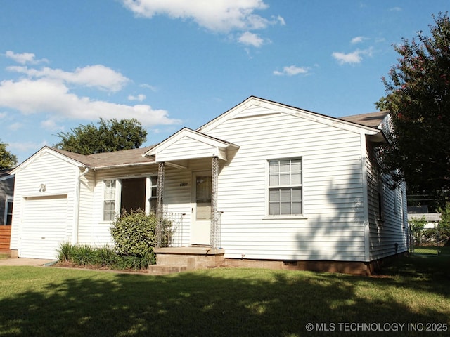 4957 S Cincinnati Ave, Tulsa, OK 74105 - view of front of house with a garage and a front yard
