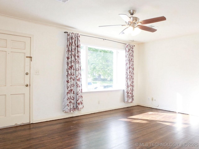 4957 S Cincinnati Ave, Tulsa, OK 74105 - empty room with wood finished floors and ceiling fan