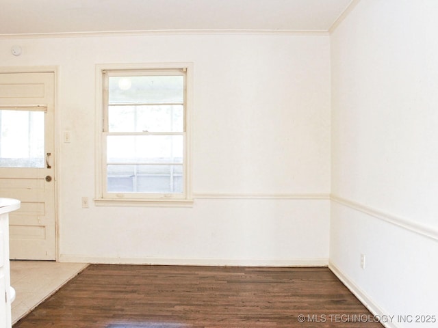 4957 S Cincinnati Ave, Tulsa, OK 74105 - unfurnished dining area with wood finished floors and ornamental molding