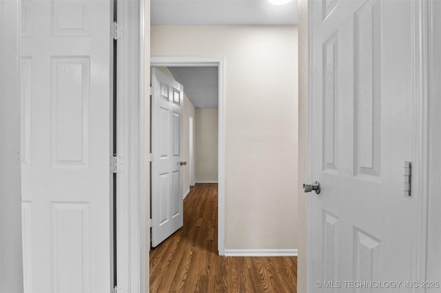 8903 N 124th E Ave, Owasso, OK 74055 - hallway with baseboards and dark wood finished floors