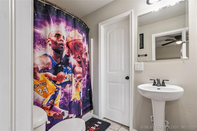 4661 E 148th St S, Bixby, OK 74008 - full bath with tile patterned floors, a ceiling fan, and curtained shower