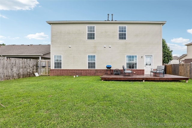 4661 E 148th St S, Bixby, OK 74008 - back of property featuring a fenced backyard and a wooden deck