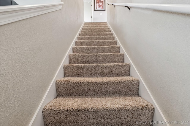 4661 E 148th St S, Bixby, OK 74008 - staircase with a textured wall